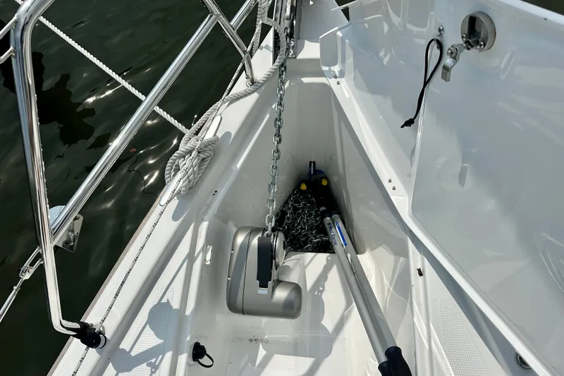 Slide: The Image of Anchor chain and equipment on a 2021 Hanse 348 sailboat deck. - 20