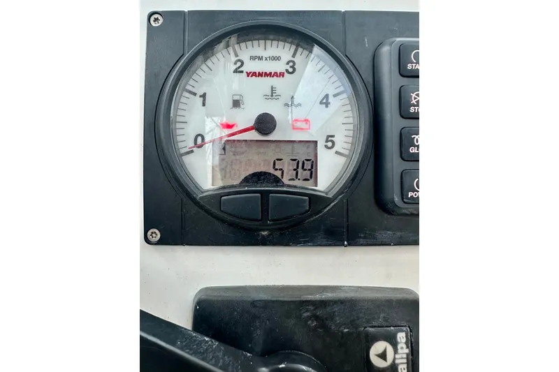 Slide: The Image of Close-up of a Yanmar RPM gauge on a 2021 Hanse 348 sailboat. - 29