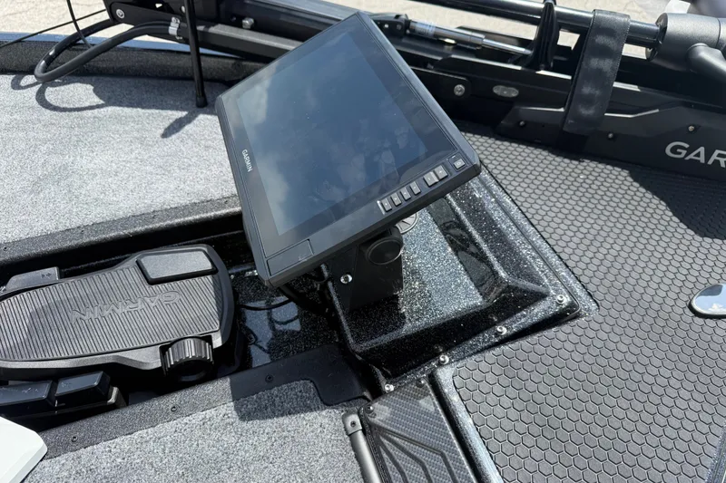 Slide: The Image of 2027 Phoenix 721 ZXL boat dashboard with Garmin display and foot pedal controls. - 9