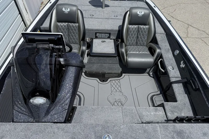 Slide: The Image of 2027 Phoenix 721 ZXL boat interior with dual seats and Garmin navigation system. - 10