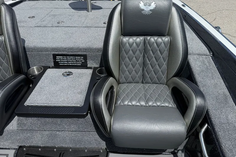 Slide: The Image of Luxurious seating in 2027 Phoenix 721 ZXL boat, featuring diamond-stitched upholstery and cup holders. - 12