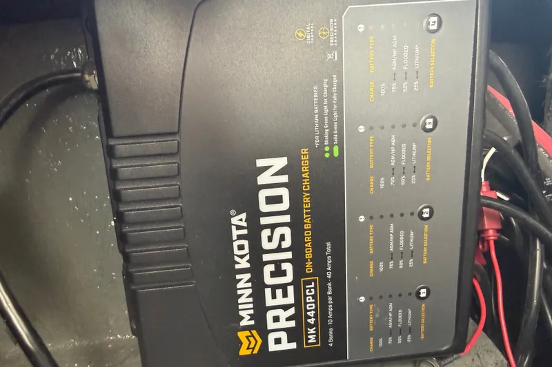Slide: The Image of Minn Kota Precision MK 440PC onboard battery charger in Phoenix 721 ZXL, 2027 model. - 20