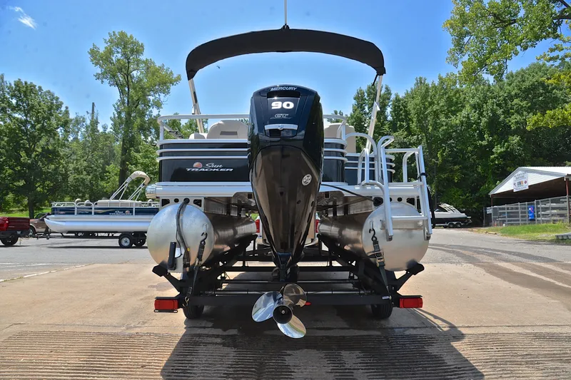 Slide: The Image of 2022 Sun Tracker Fishin' Barge 20 DLX pontoon boat with Mercury 90 engine, rear view. - 13