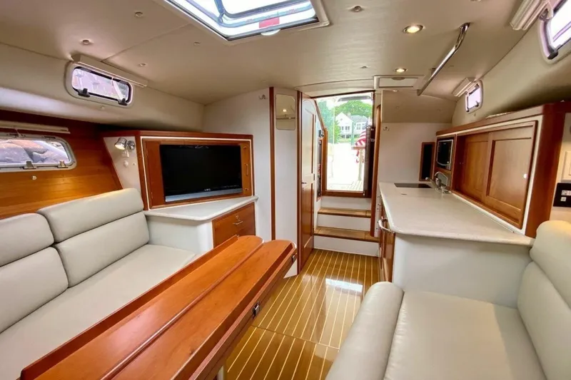 Slide: The Image of Luxurious interior of 2013 MJM 36z Downeast yacht with elegant wood finishes and modern amenities. - 19