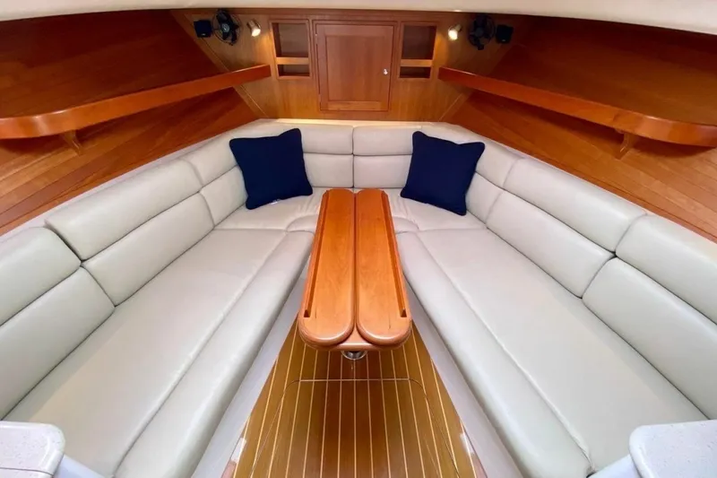 Slide: The Image of Luxurious interior of 2013 MJM 36z Downeast yacht with elegant seating and wooden accents. - 28