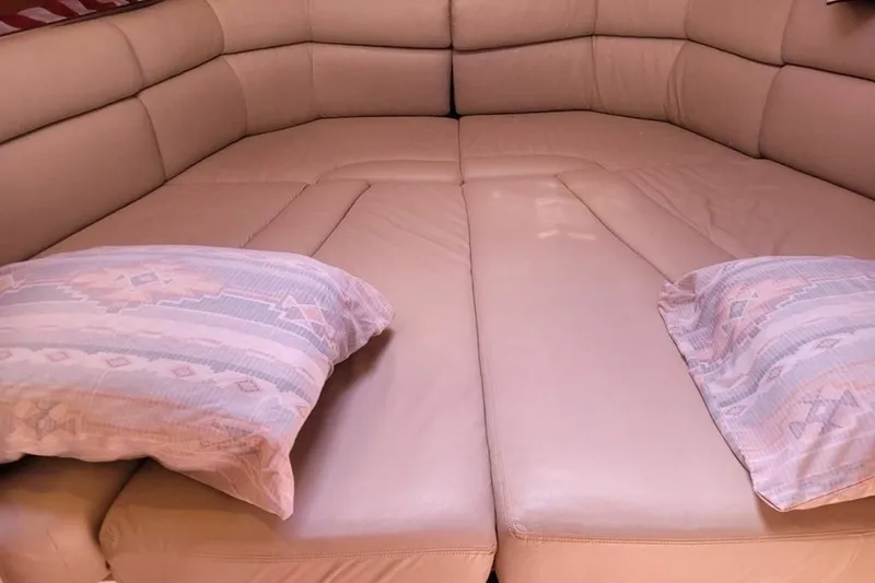 Slide: The Image of Luxurious beige leather seating area in 2013 MJM 36z Downeast boat interior. - 31
