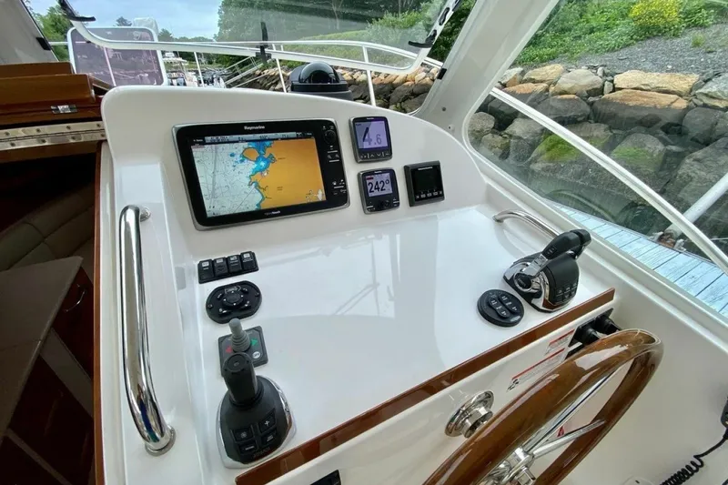 Slide: The Image of Helm of 2013 MJM 36z Downeast boat with navigation equipment and controls. - 12