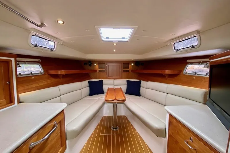 Slide: The Image of Luxurious interior of 2013 MJM 36z Downeast yacht with elegant seating and wood finishes. - 27