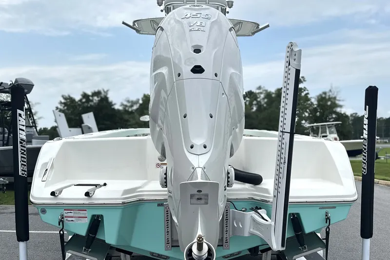 Slide: The Image of 2027 Pathfinder 2700 Tournament boat with powerful outboard motor, displayed outdoors. - 27