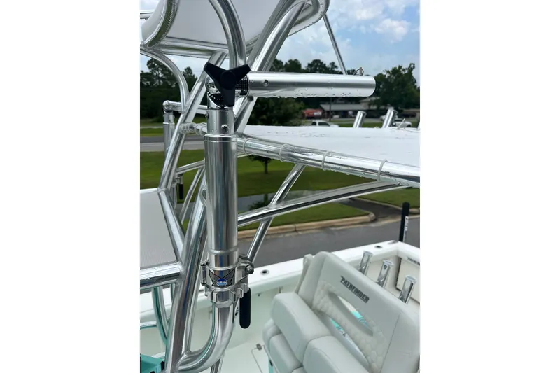Slide: The Image of 2027 Pathfinder 2700 Tournament boat with sleek metal framework and seating. - 12