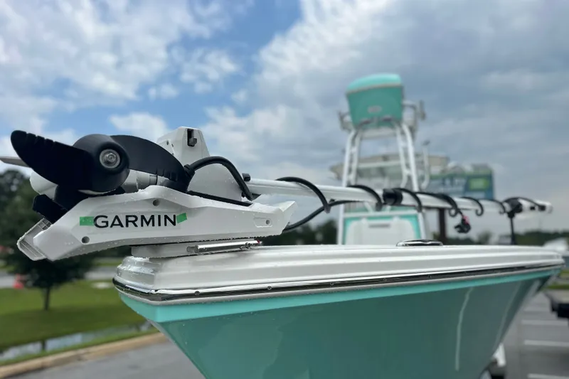 Slide: The Image of Pathfinder 2700 Tournament 2027 boat with Garmin equipment, under a cloudy sky. - 30