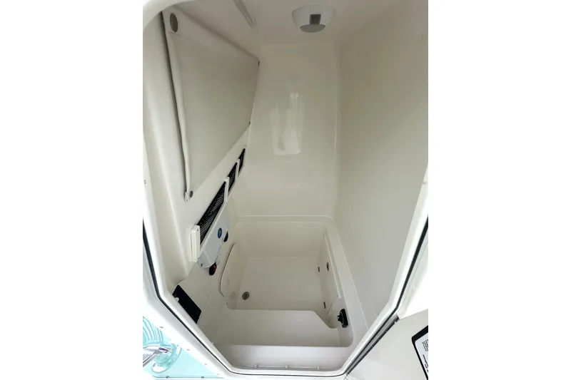 Slide: The Image of Interior view of 2027 Pathfinder 2700 Tournament boat compartment, showcasing storage space and design. - 6