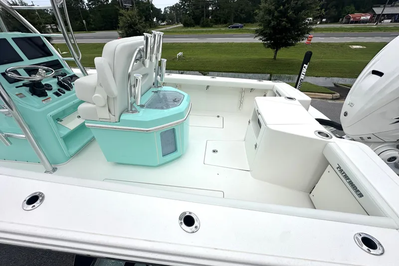 Slide: The Image of 2027 Pathfinder 2700 Tournament boat interior with helm, seating, and storage compartments. - 17