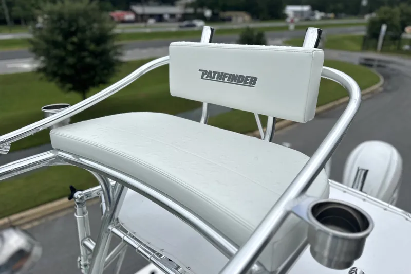 Slide: The Image of 2027 Pathfinder 2700 Tournament boat seat with logo, featuring sleek white upholstery. - 13