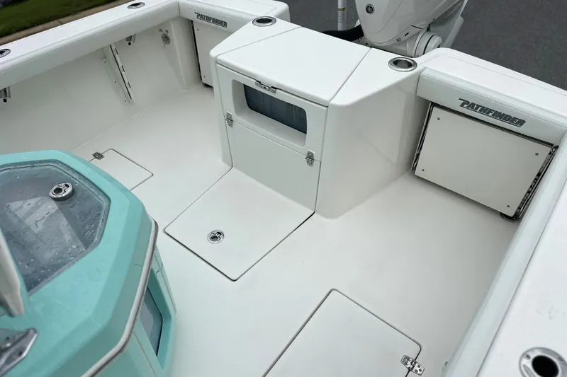 Slide: The Image of 2027 Pathfinder 2700 Tournament boat interior with storage compartments and seating area. - 11