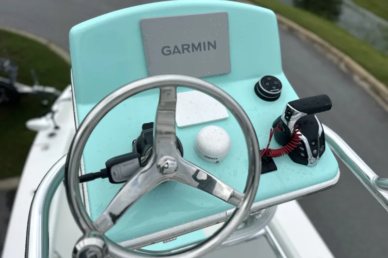 Slide: The Image of Steering console of 2027 Pathfinder 2700 Tournament boat with Garmin navigation system. - 14