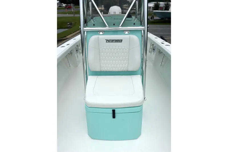 Slide: The Image of 2027 Pathfinder 2700 Tournament boat seat with teal and white upholstery. - 7