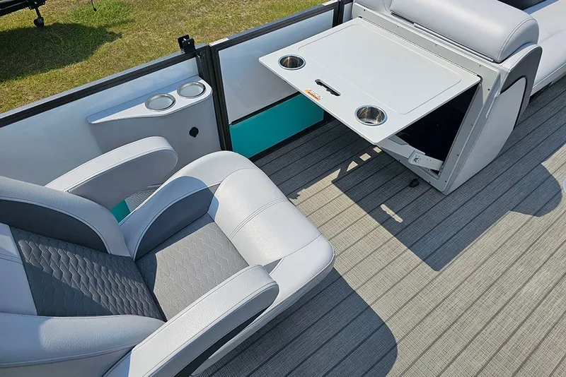 Slide: The Image of Luxurious seating and table setup on 2026 Bentley Pontoons 253 Elite Swingback DC. - 16