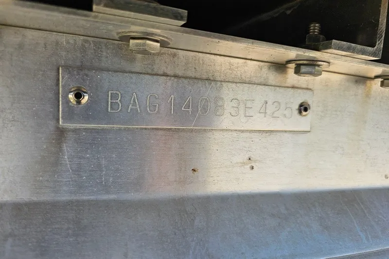 Slide: The Image of Hull identification number on a 2026 Bentley Pontoons 253 Elite Swingback DC. - 24