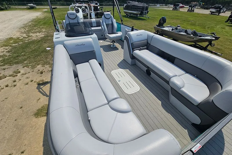 Slide: The Image of Luxurious 2026 Bentley Pontoons 253 Elite Swingback DC with spacious seating and modern design. - 10