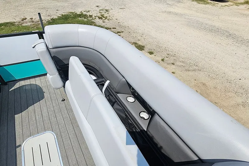 Slide: The Image of 2026 Bentley Pontoons 253 Elite Swingback DC interior with sleek seating and cup holders. - 21