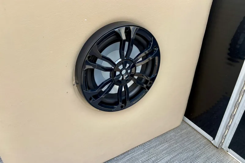 Slide: The Image of Speaker installed on 2023 Sweetwater 2286 FSL boat, featuring sleek black grille design. - 40
