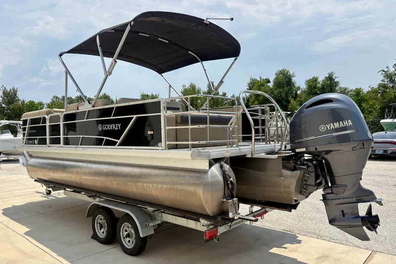 Slide: The Image of 2023 Sweetwater 2286 FSL pontoon boat with Yamaha motor on trailer. - 6