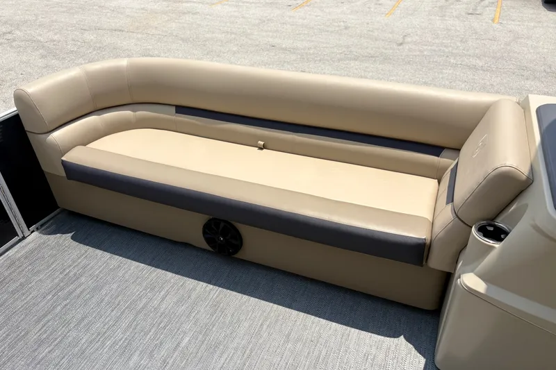 Slide: The Image of Luxurious seating on 2023 Sweetwater 2286 FSL pontoon boat, featuring beige upholstery. - 29