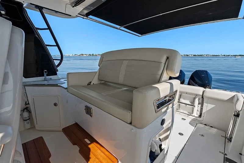 Slide: The Image of Helm deck second row seat with a conversation seatback - 17