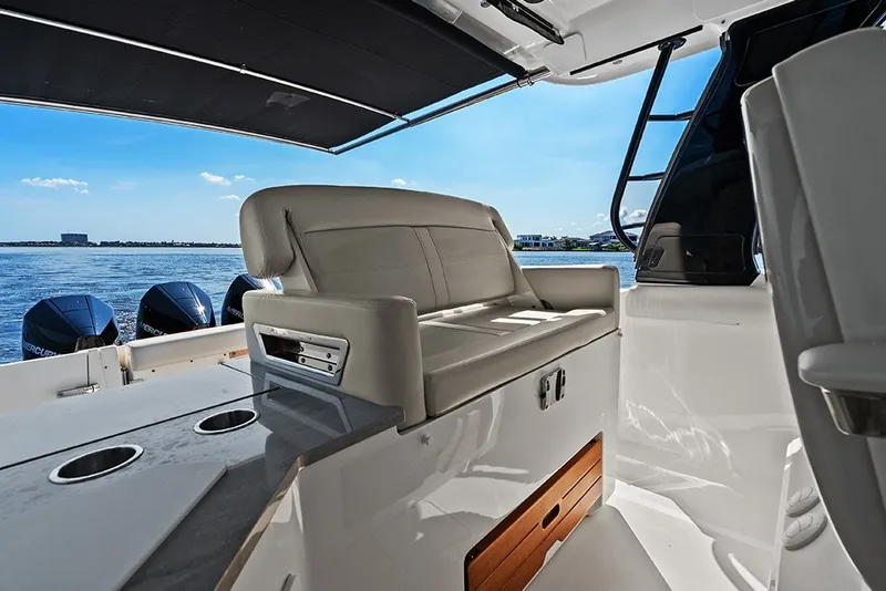 Slide: The Image of Helm deck second row seat with a conversation seatback - 18