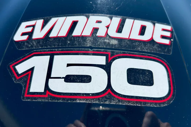 Slide: The Image of Evinrude 150 engine decal on 2006 Ranger 180 Reata boat. - 14