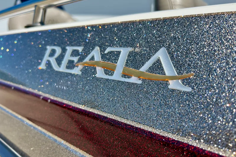 Slide: The Image of Close-up of 2006 Ranger 180 Reata boat logo with glittery finish. - 7