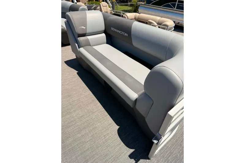 Slide: The Image of 2024 Bennington SV 20 pontoon boat seating in gray upholstery, showcasing comfort and style. - 9