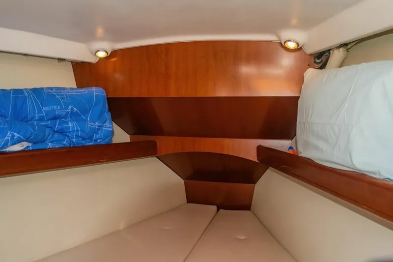 Slide: The Image of Cozy cabin interior of 2007 Beneteau Oceanis Clipper 523 yacht with wooden accents. - 30