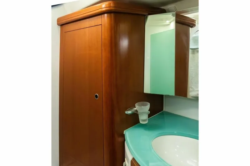 Slide: The Image of Wooden cabinet and mirror in 2007 Beneteau Oceanis Clipper 523 yacht bathroom. - 18