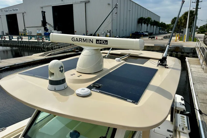 Slide: The Image of 2019 Scout 355 LXF boat with Garmin xHD2 radar at Palm Cove Marina. - 27