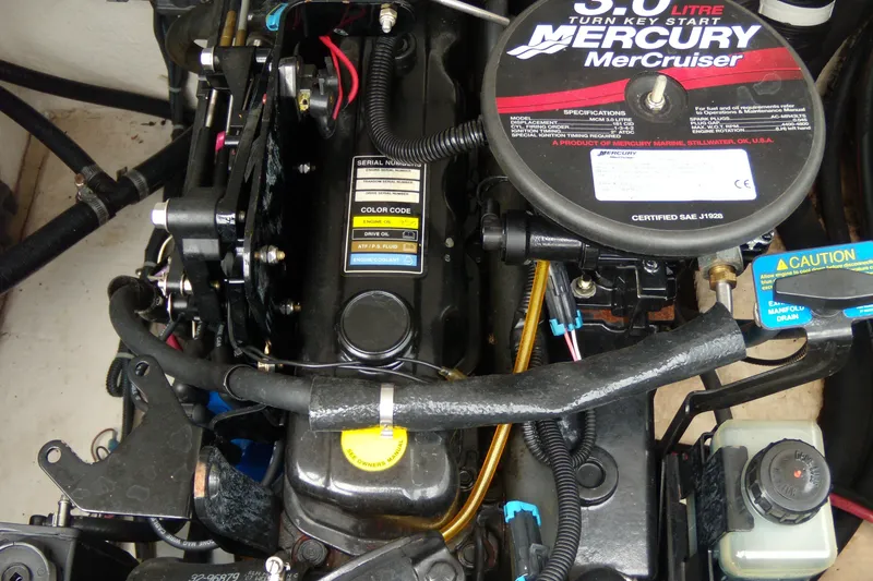 Slide: The Image of Engine compartment of a 2008 Tahoe Q4 SF with Mercury MerCruiser components. - 11