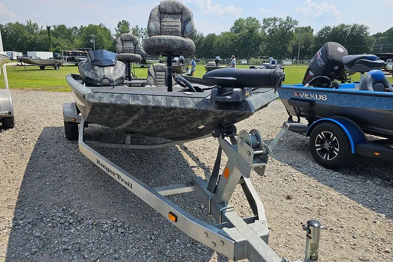 Slide: The Image of 2020 Ranger RT178 fishing boat on trailer, parked outdoors on gravel. - 5