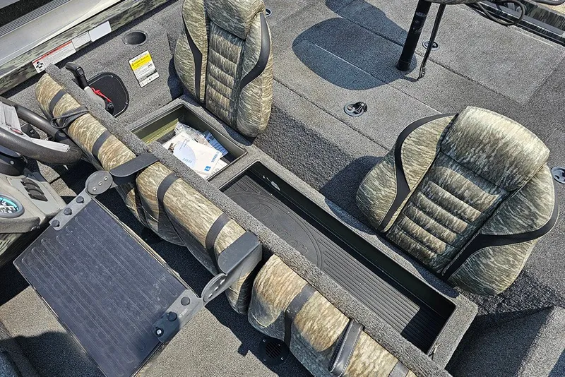 Slide: The Image of 2020 Ranger RT178 boat interior with camo seats and storage compartments. - 13