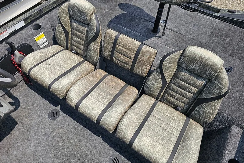 Slide: The Image of 2020 Ranger RT178 boat interior with camo-patterned seating and carpeted flooring. - 12