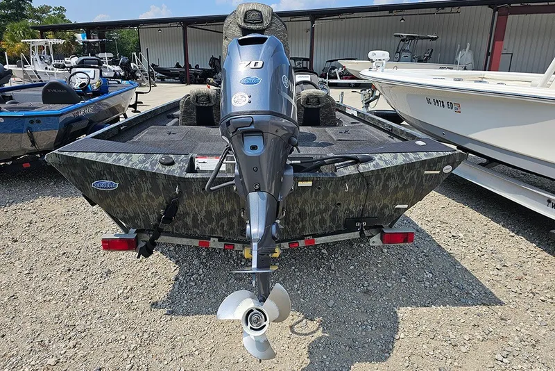 Slide: The Image of 2020 Ranger RT178 boat with outboard motor, parked on gravel lot. - 8