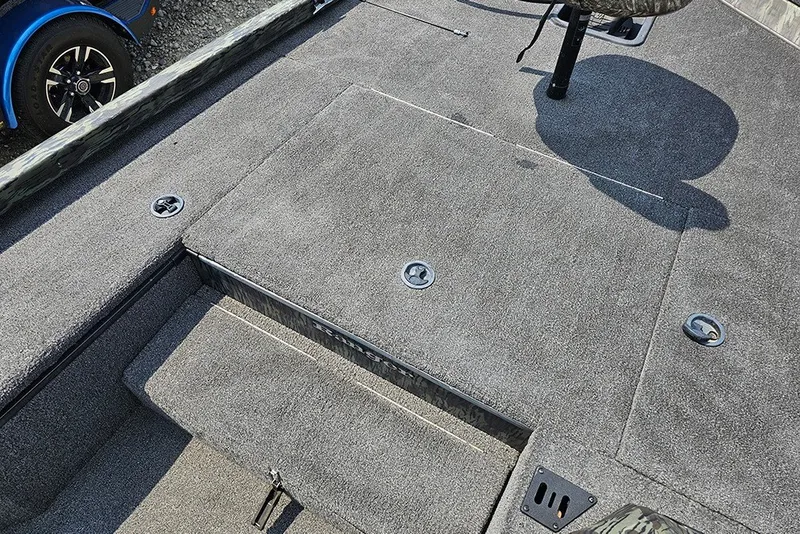 Slide: The Image of 2020 Ranger RT178 boat deck with gray carpet and storage compartments. - 15