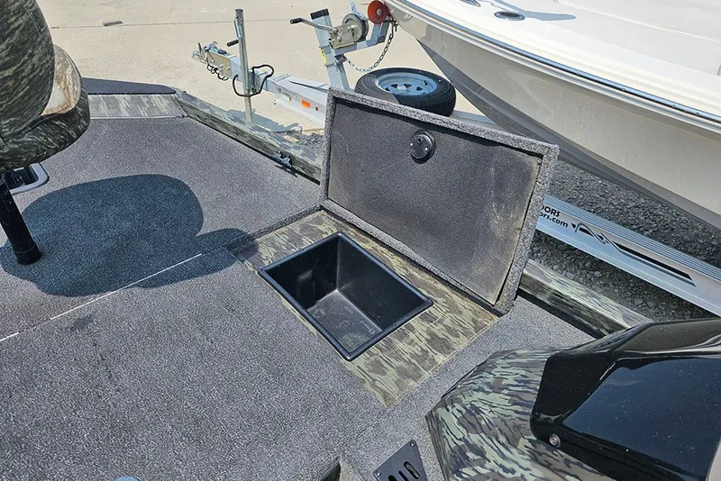 Slide: The Image of 2020 Ranger RT178 boat with open storage compartment on deck. - 18