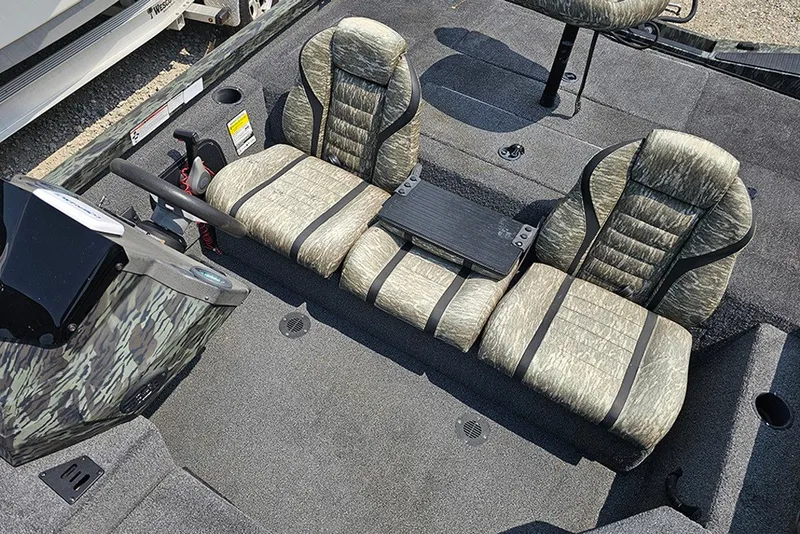 Slide: The Image of 2020 Ranger RT178 boat interior with camo seats and steering console. - 11