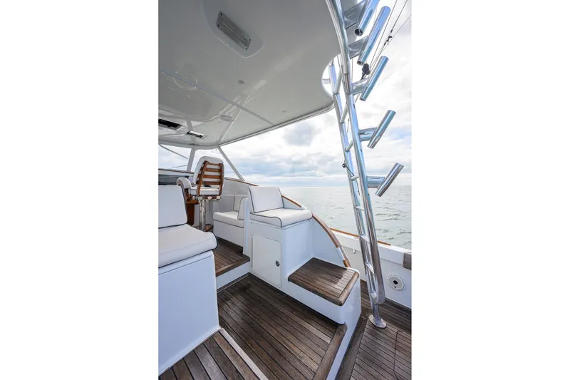 Slide: The Image of Luxurious 2014 Release Boatworks 46 yacht interior with wooden deck and seating. - 28