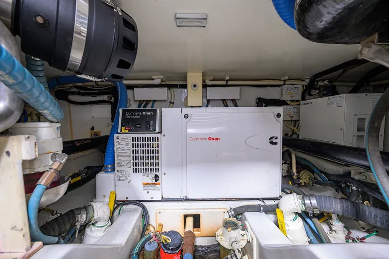 Slide: The Image of Engine room of 2014 Release Boatworks 46 with Cummins Onan generator. - 57