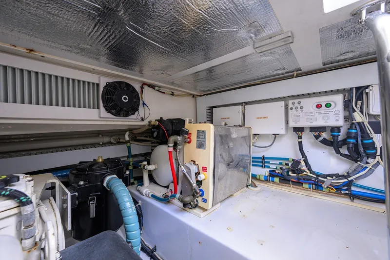 Slide: The Image of Engine room of 2014 Release Boatworks 46, showcasing mechanical and electrical components. - 61