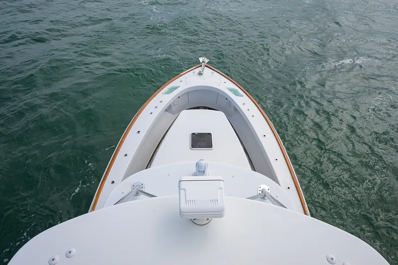 Slide: The Image of Bow view of 2014 Release Boatworks 46 on open water. - 10