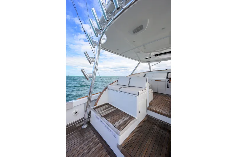 Slide: The Image of Luxurious 2014 Release Boatworks 46 yacht interior with cushioned seating and ocean view. - 27