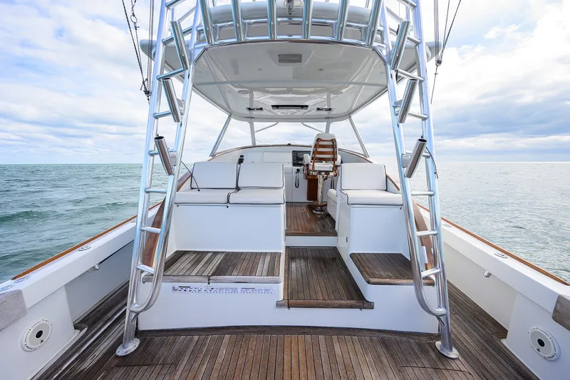 Slide: The Image of 2014 Release Boatworks 46 yacht interior with wooden deck and ocean view. - 26